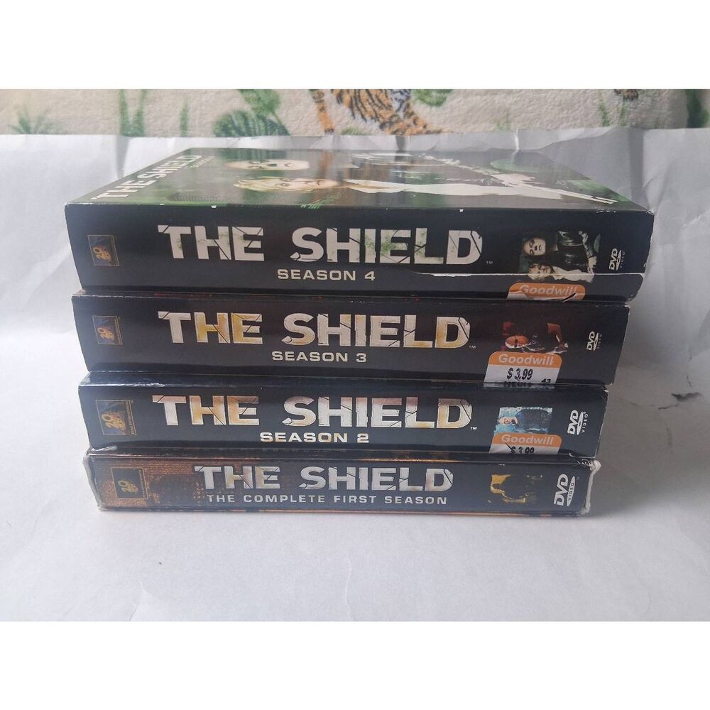 The Shield Seasons 1 thru 4 DVD Sets PreOwned and viewed